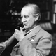 Tolkien enjoying a pipe in his study at Merton College.